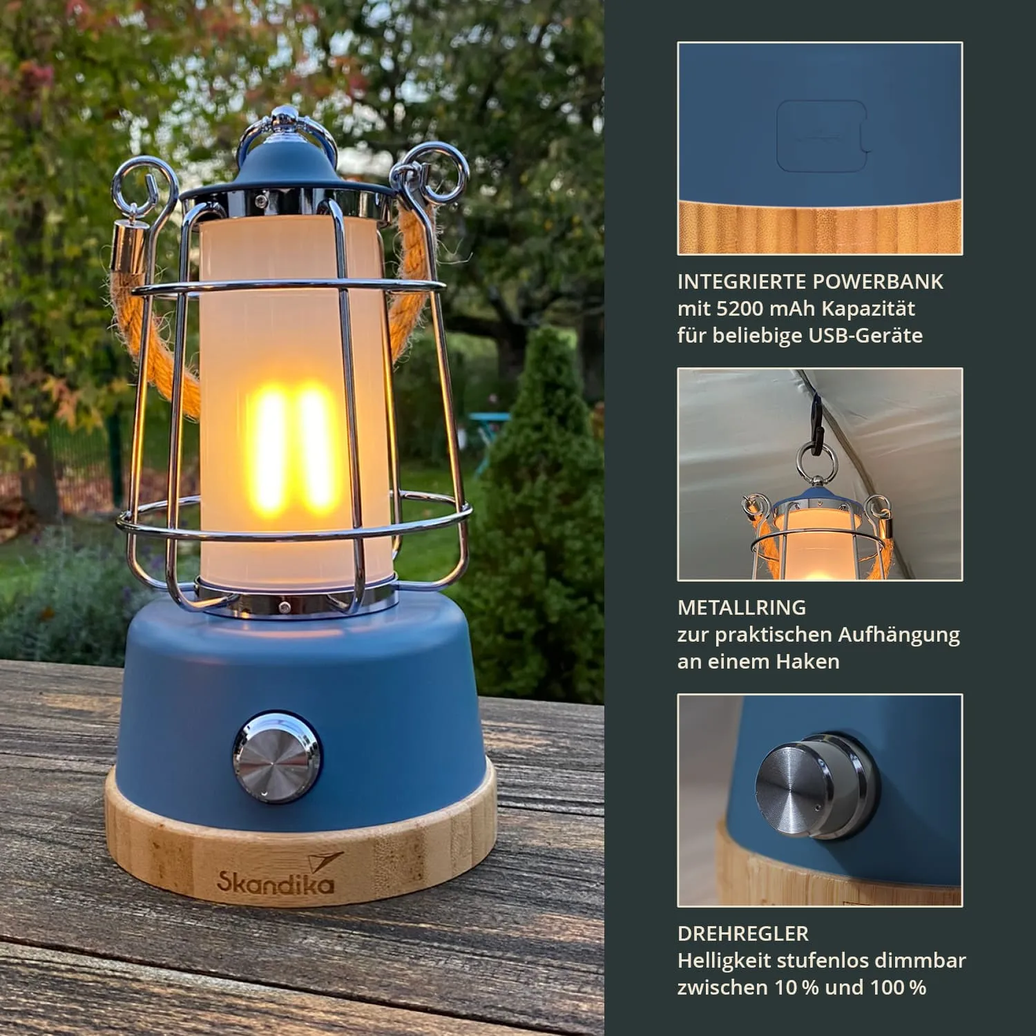 Laterne mit einem blauen Gehäuse, Metallschutz, Holzsockel und einer integrierten USB-Powerbank, auf einem Tisch im Freien.