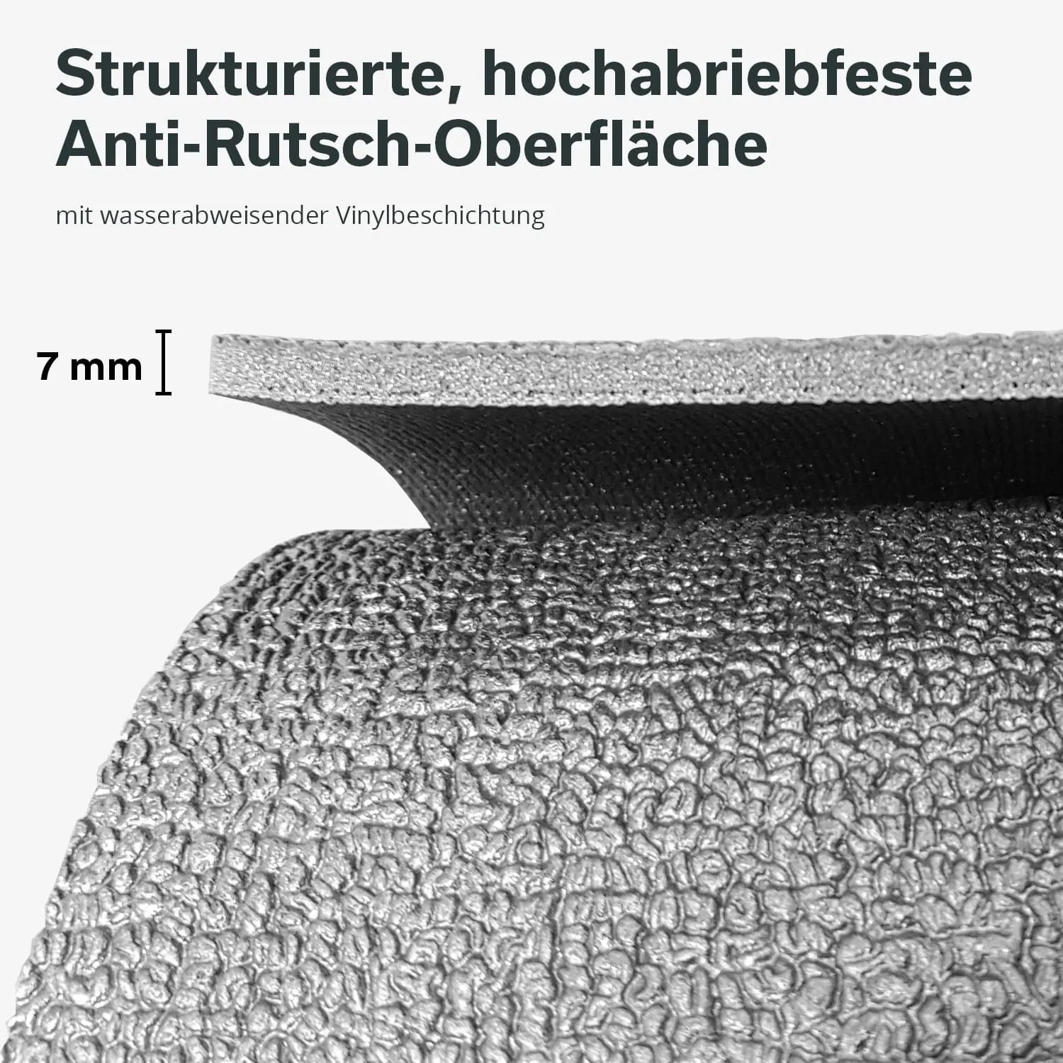 Nahaufnahme einer strukturierten, rutschfesten Oberfläche mit einer Dicke von 7 mm, grau und mit wasserabweisender Beschichtung.