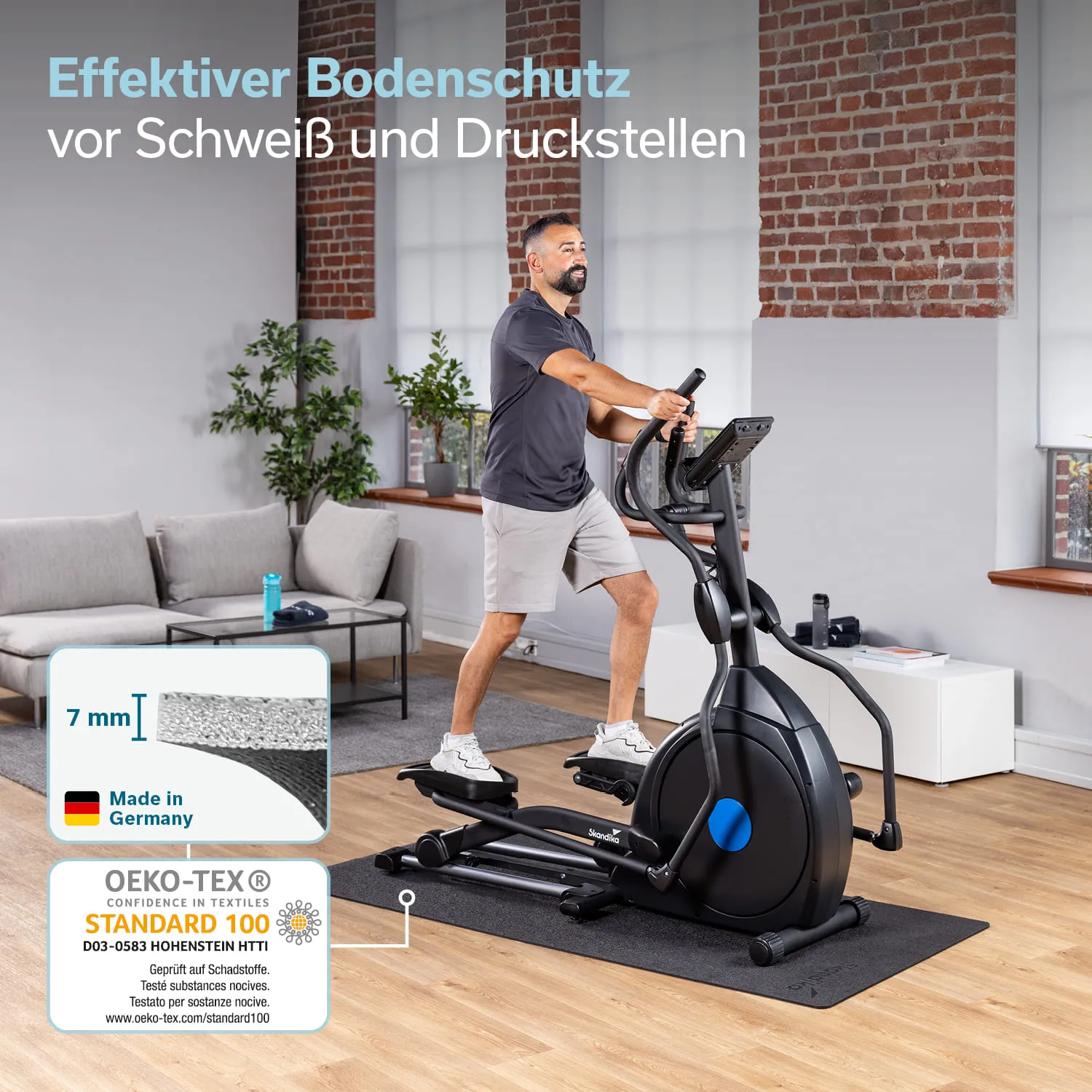 Mann auf einem Ellipsentrainer in einem modernen Raum. Hervorhebung eines Bodenschutzes aus 7 mm dickem Material.