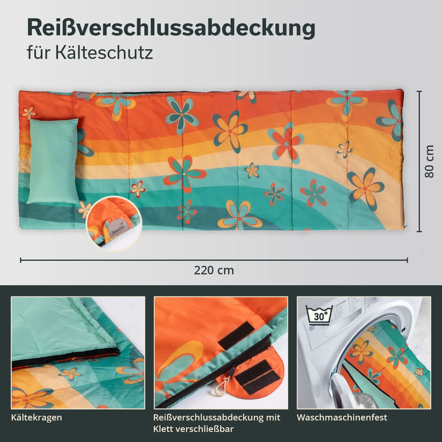 Bunte Schlafsackabdeckung in Orange und Grün mit Blumenmuster, Maßstab und Waschhinweis. Kälteschutz und Reißverschlussabdeckung sind sichtbar.