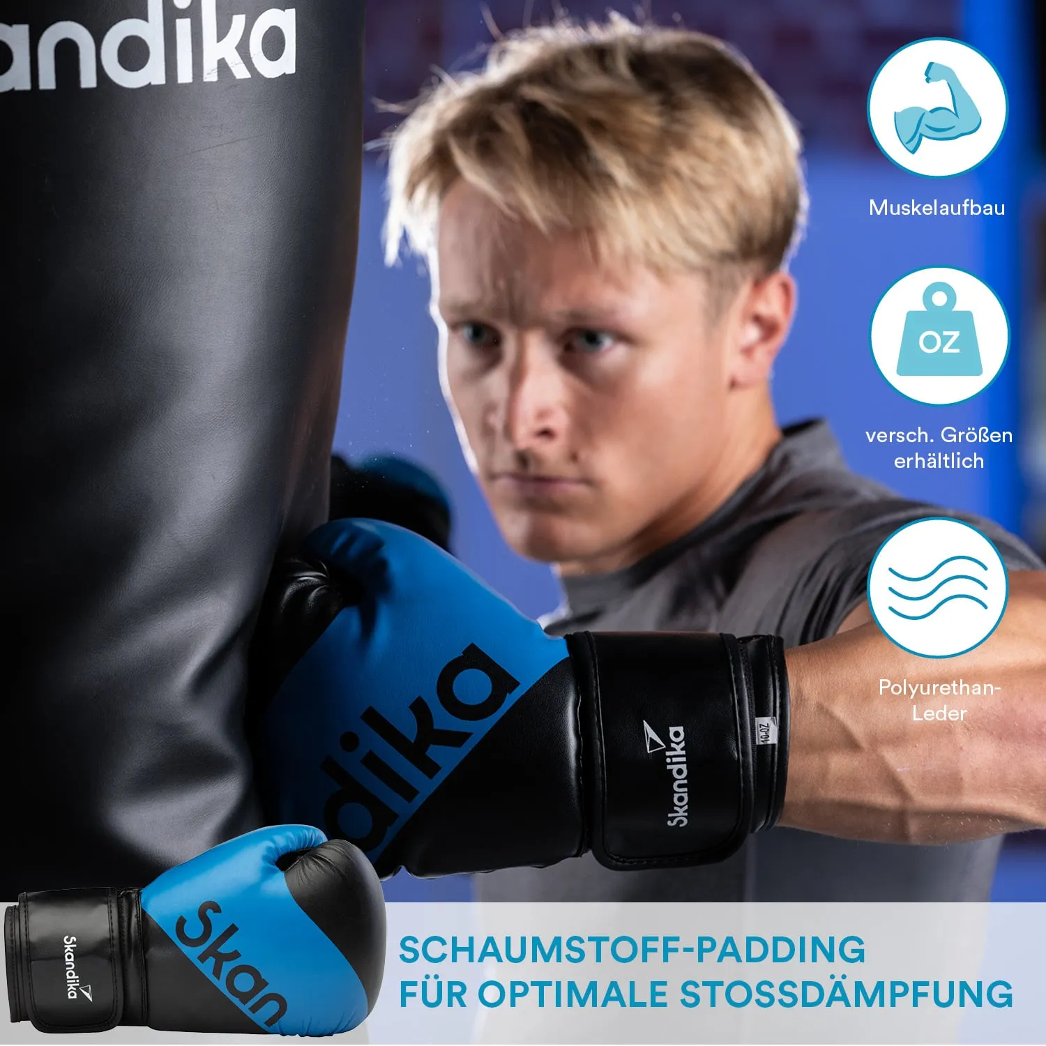 Mann mit blauen Boxhandschuhen trifft auf einen schwarzen Boxsack. Trainingsumgebung mit unscharfem Hintergrund.
