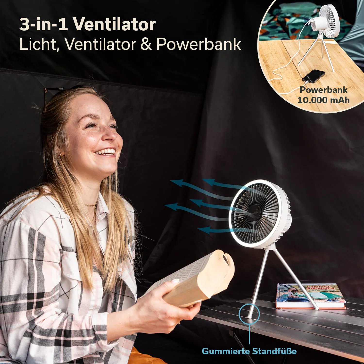3-in-1 Ventilator auf einem Tisch. Eine lächelnde Person hält ein Buch. Dunkler Hintergrund mit einigen weiteren Gegenständen.