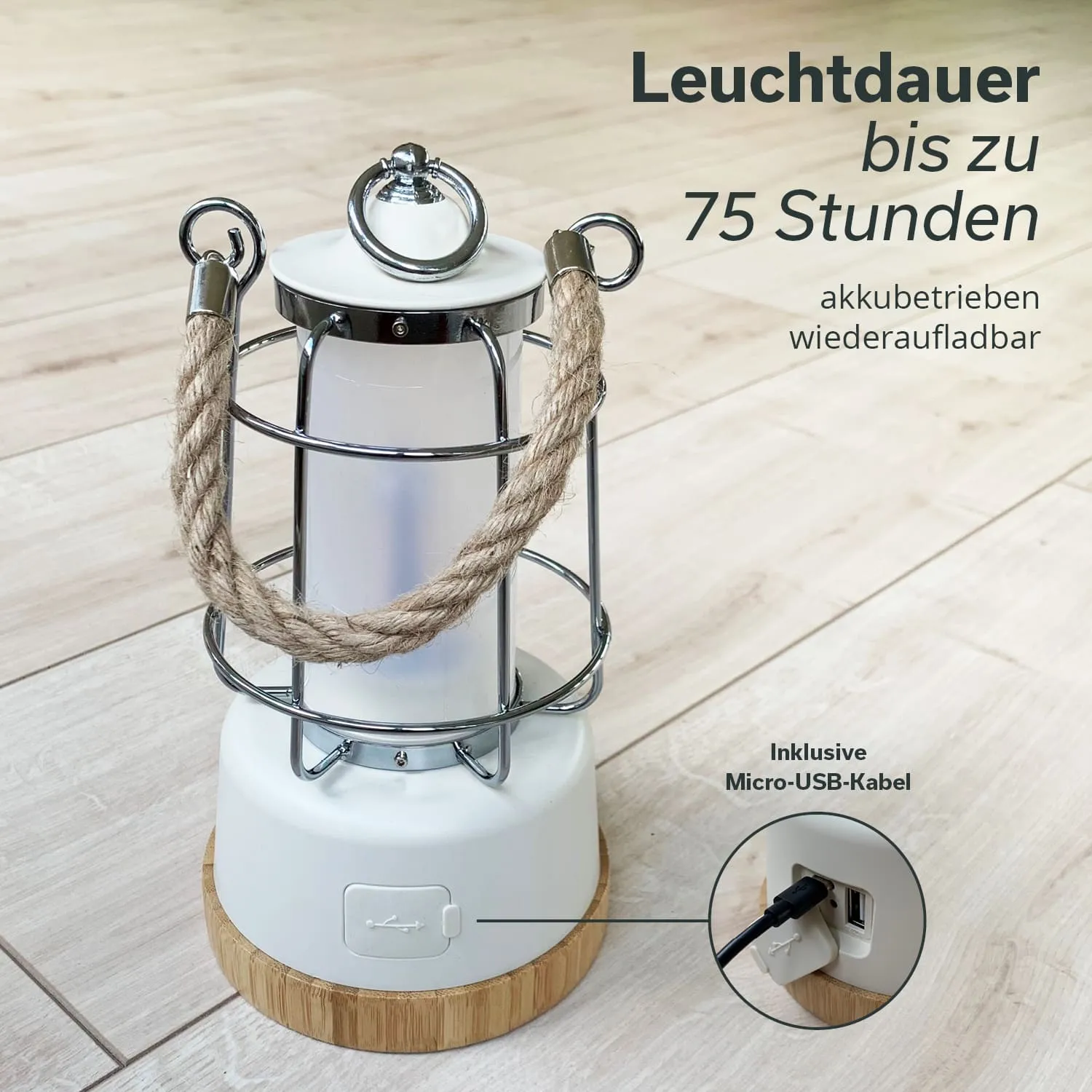 Akku-Lampe mit Metallgitter und Seilgriff, auf einem holzähnlichen Boden Mikro-USB-Anschluss sichtbar.