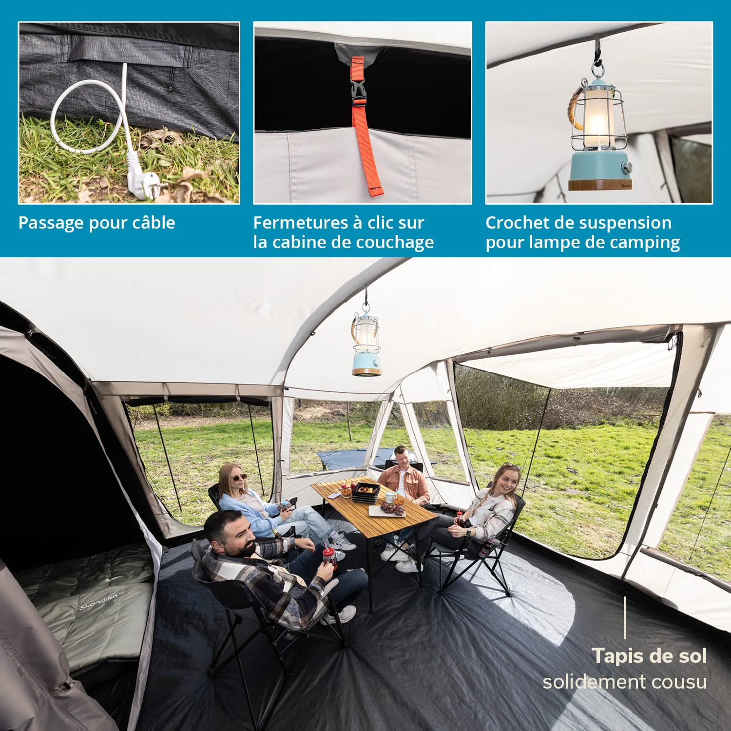 Zeltinneneinrichtung mit Tisch und Stühlen. Personen sitzen am Tisch mit Getränken. Über dem Tisch hängt eine Lampe.