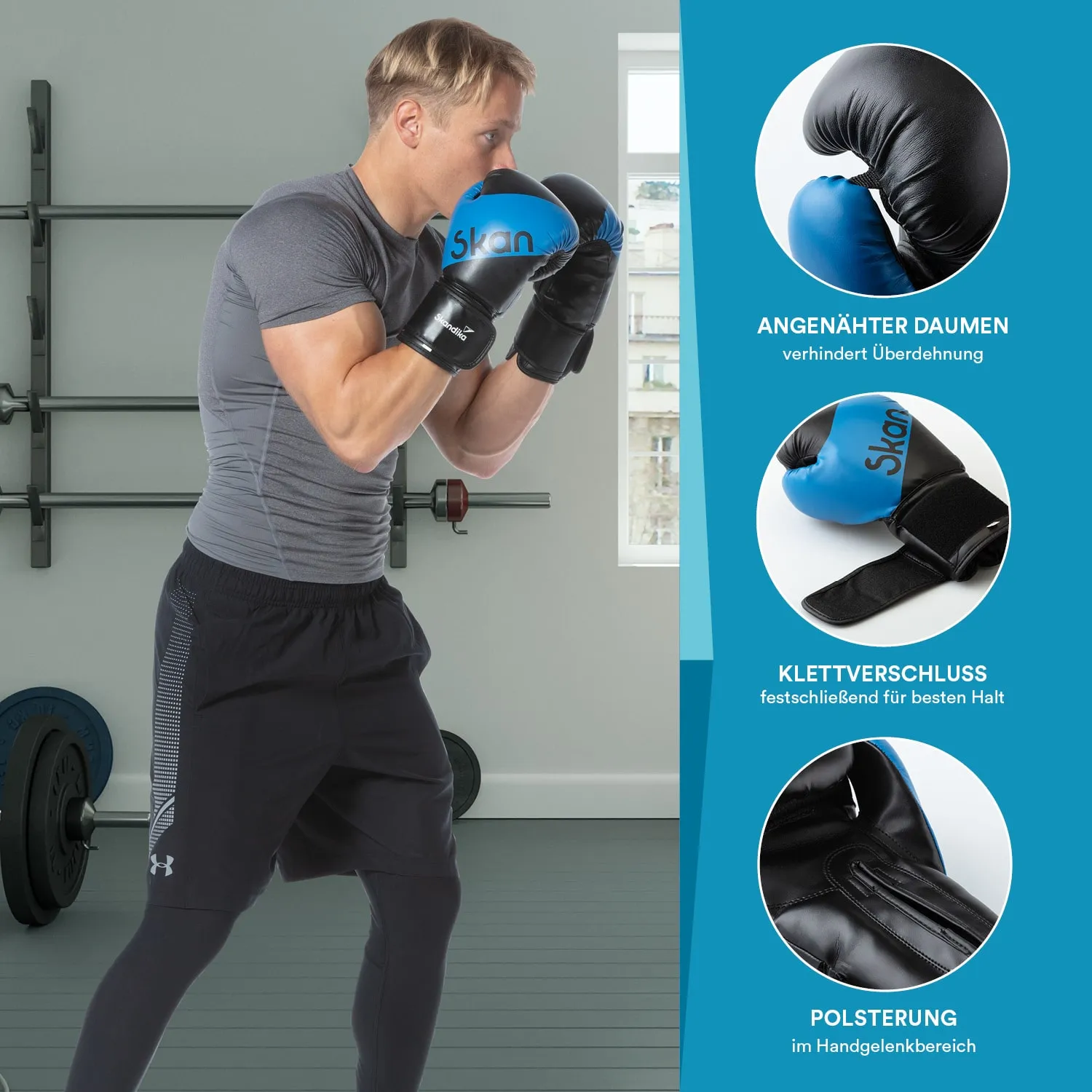 Mann in Sportkleidung trägt blaue und schwarze Boxhandschuhe. Er steht in einem Fitnessraum. Gewichte im Hintergrund sichtbar.
