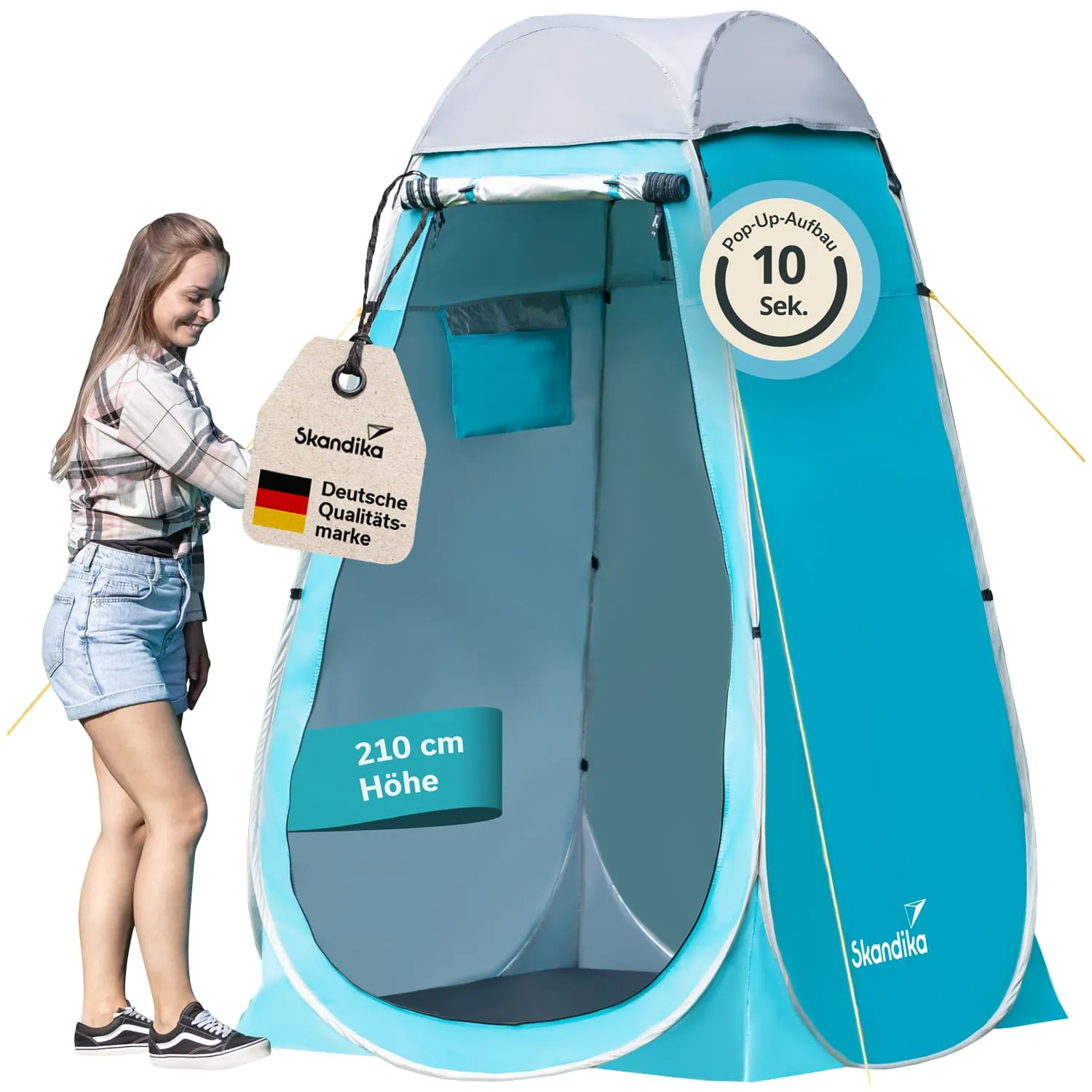 Pop-Up-Zelt in Blau und Grau mit einer Person, die eine Etikette anfasst. Zelt steht auf geradem Boden, innen hell.