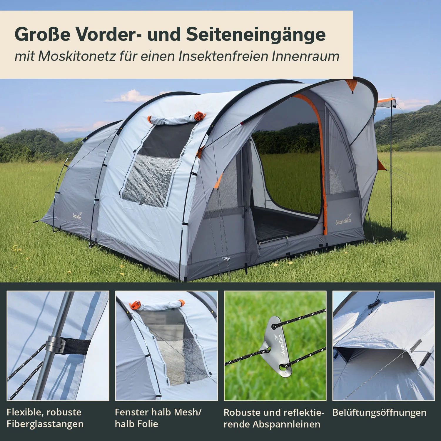 Zelt mit großen Vorder- und Seiteneingängen, grauer Stoff mit orangefarbenen Akzenten, auf einer grünen Wiese. Ansicht von außen.