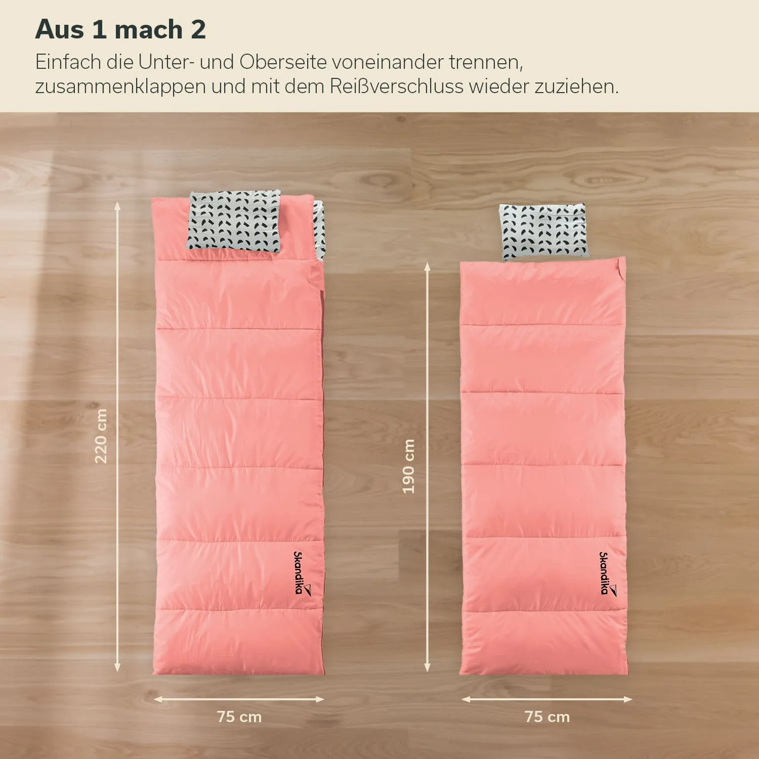 Zwei Schlafsäcke in korallenrot auf einem Holzfußboden. Der linke Schlafsack ist 220 cm lang, der rechte 190 cm. Beide haben eine gepolsterte Oberseite mit einem Muster.