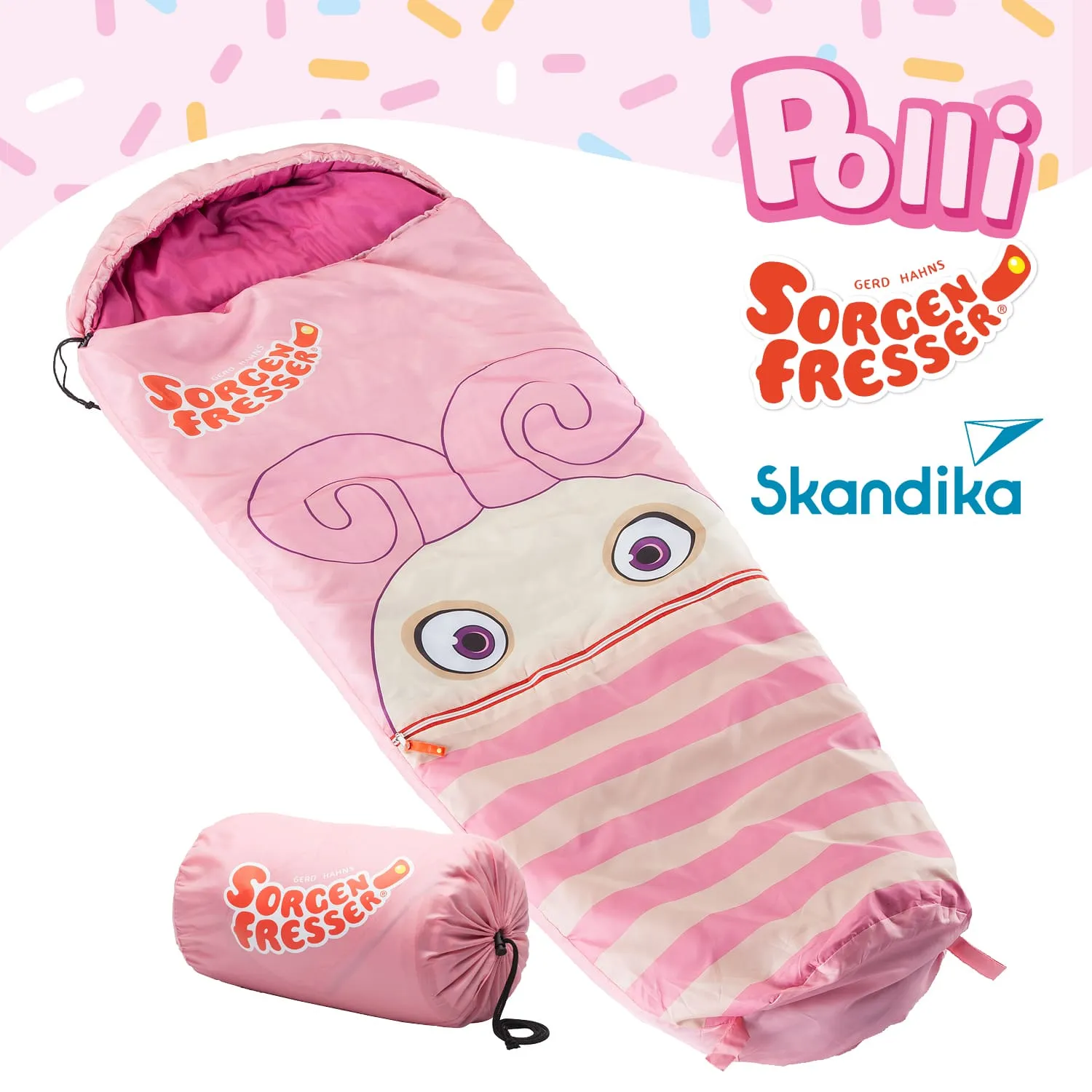 Schlafsack in pink mit einem Gesicht und Streifenmuster, daneben ein passender Aufbewahrungsbeutel.