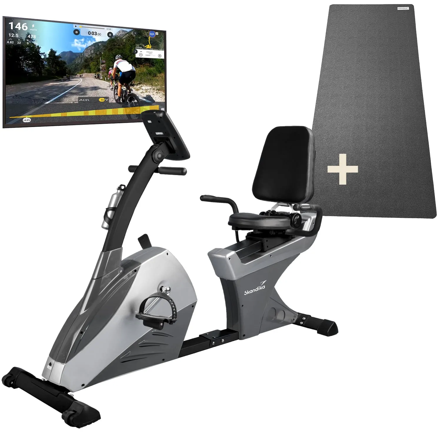 Ein Liegeergometer in Silber mit schwarzem Sitz, daneben eine Trainingsmatte und ein Bildschirm, der eine Fahrradtour zeigt.