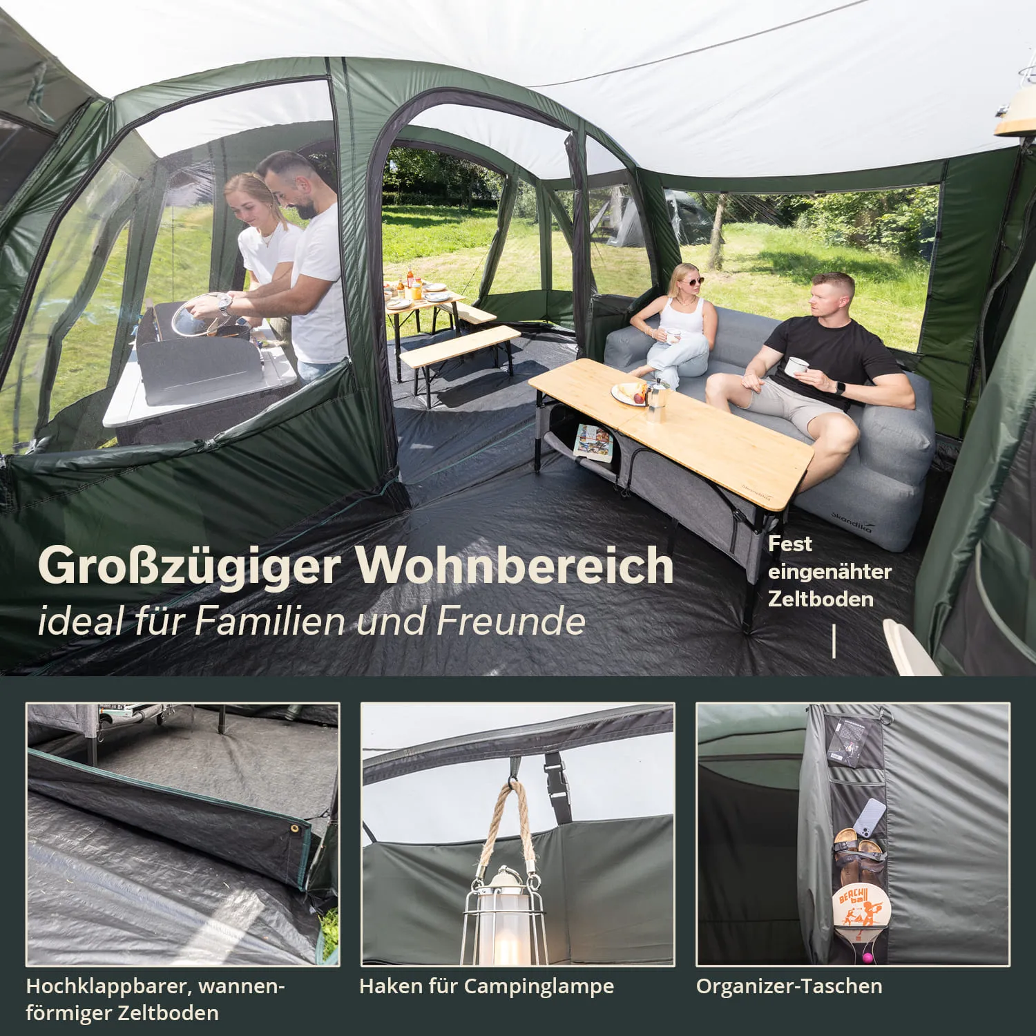 Zelt mit großem Wohnbereich, Tischen und Couch. Personen bereiten Essen vor. Auf dem Boden Organizer-Taschen sichtbar.