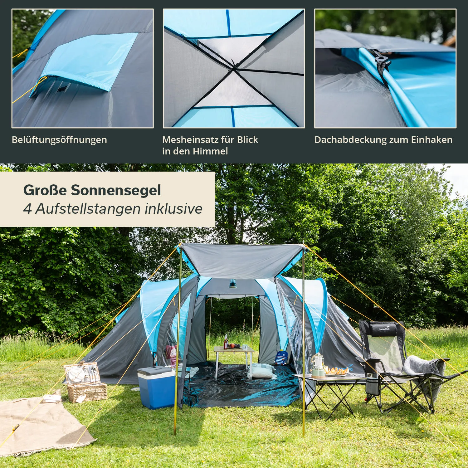 Zelt mit blauen und grauen Elementen, auf einer Wiese aufgestellt. Es gibt sichtbare Belüftungsöffnungen und einen Mesheinsatz. Vier Aufstellstangen sind vorhanden, außerdem ein Tisch mit Stühlen und einer Kühlbox. Im Hintergrund sind Bäume sichtbar.