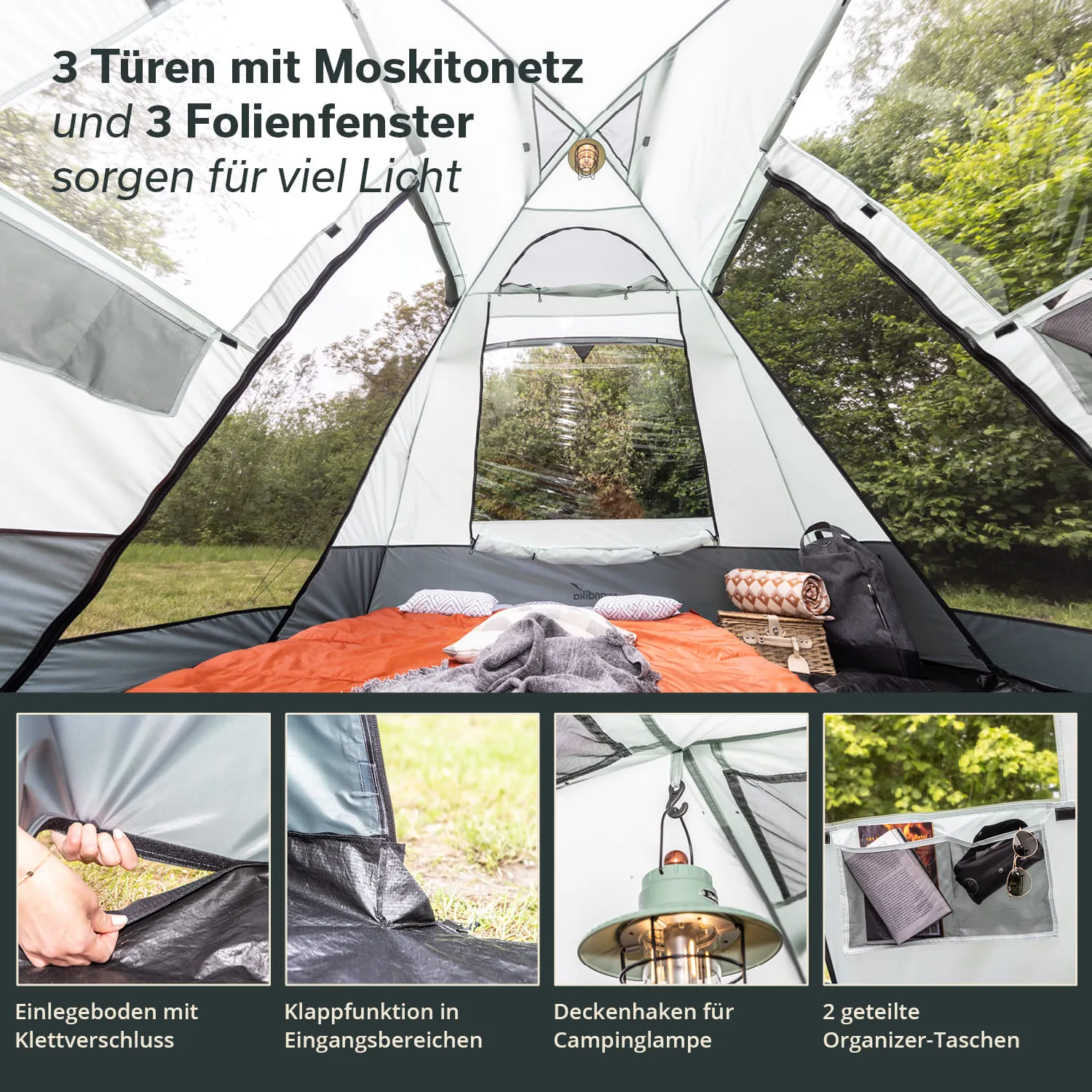 Zeltinnenseite mit drei Türen, Folienfenstern und orangefarbenem Boden, der mit Decke und Kissen ausgestattet ist. Zubehör sichtbar.