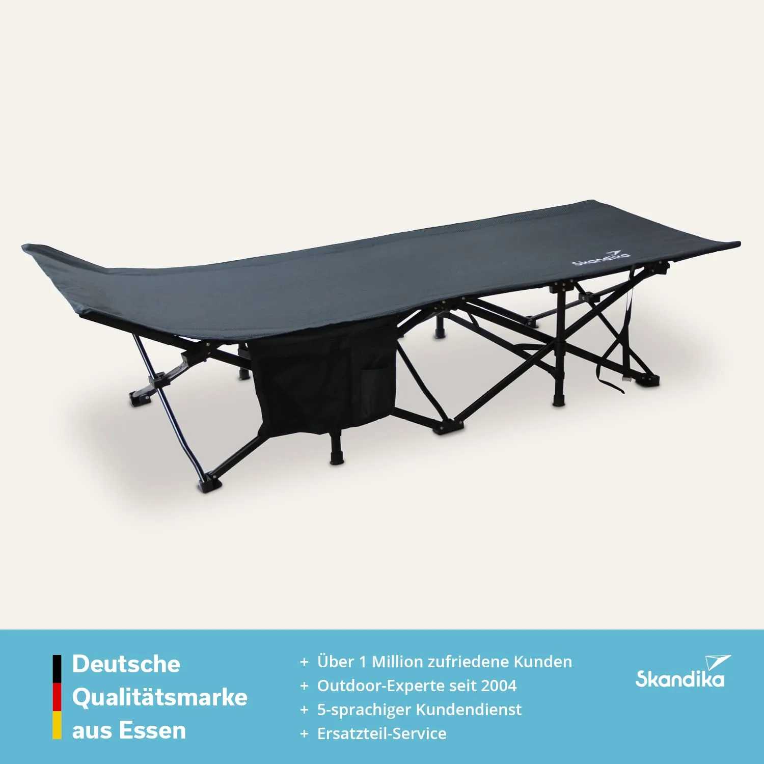 Faltliege in Schwarz mit einem seitlichen Stauraum, auf hellem Hintergrund platziert.