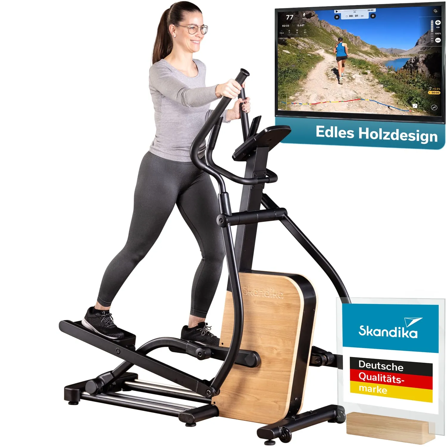 Eine Person steht auf einem Crosstrainer mit Holzdesign und bewegt sich. Im Hintergrund ist ein Bildschirm mit einer über einen Weg laufenden Person sichtbar.