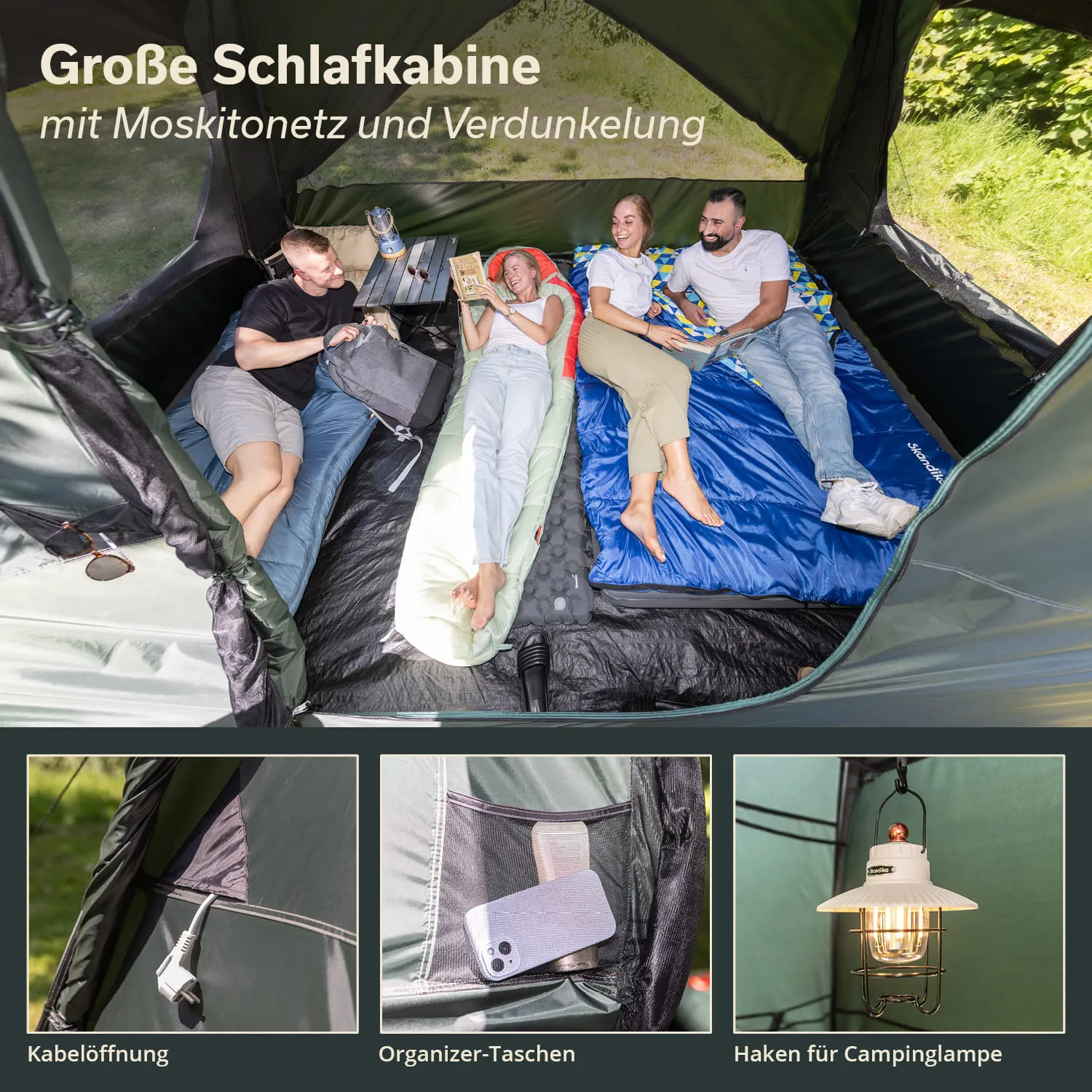 Schlafkabine mit vier Liegen, umgeben von Moskitonetz. Deko-Elemente wie Organizer-Taschen, Kabelöffnung und Lampenaufhängung sichtbar.